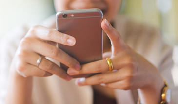 hands holding phone